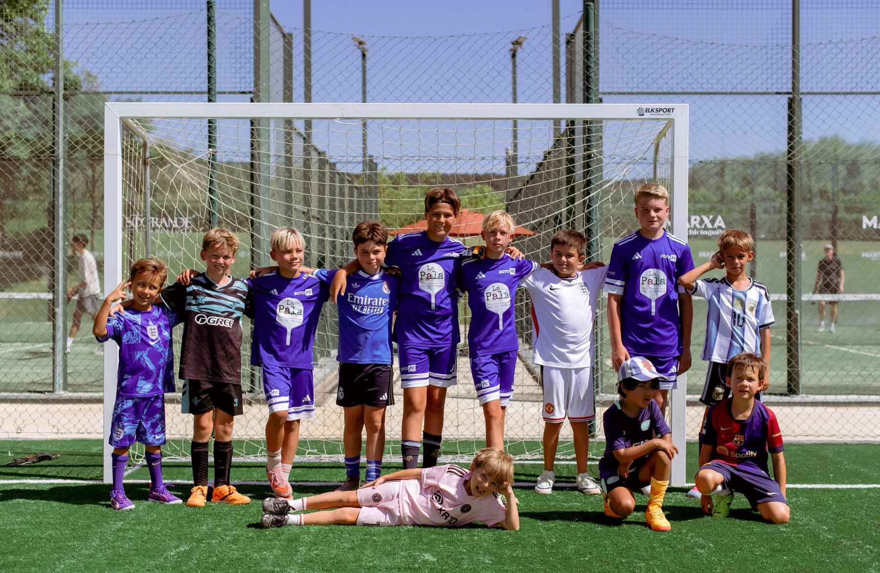 A Soto FC group gathered in front of the goal at the end of a session.
