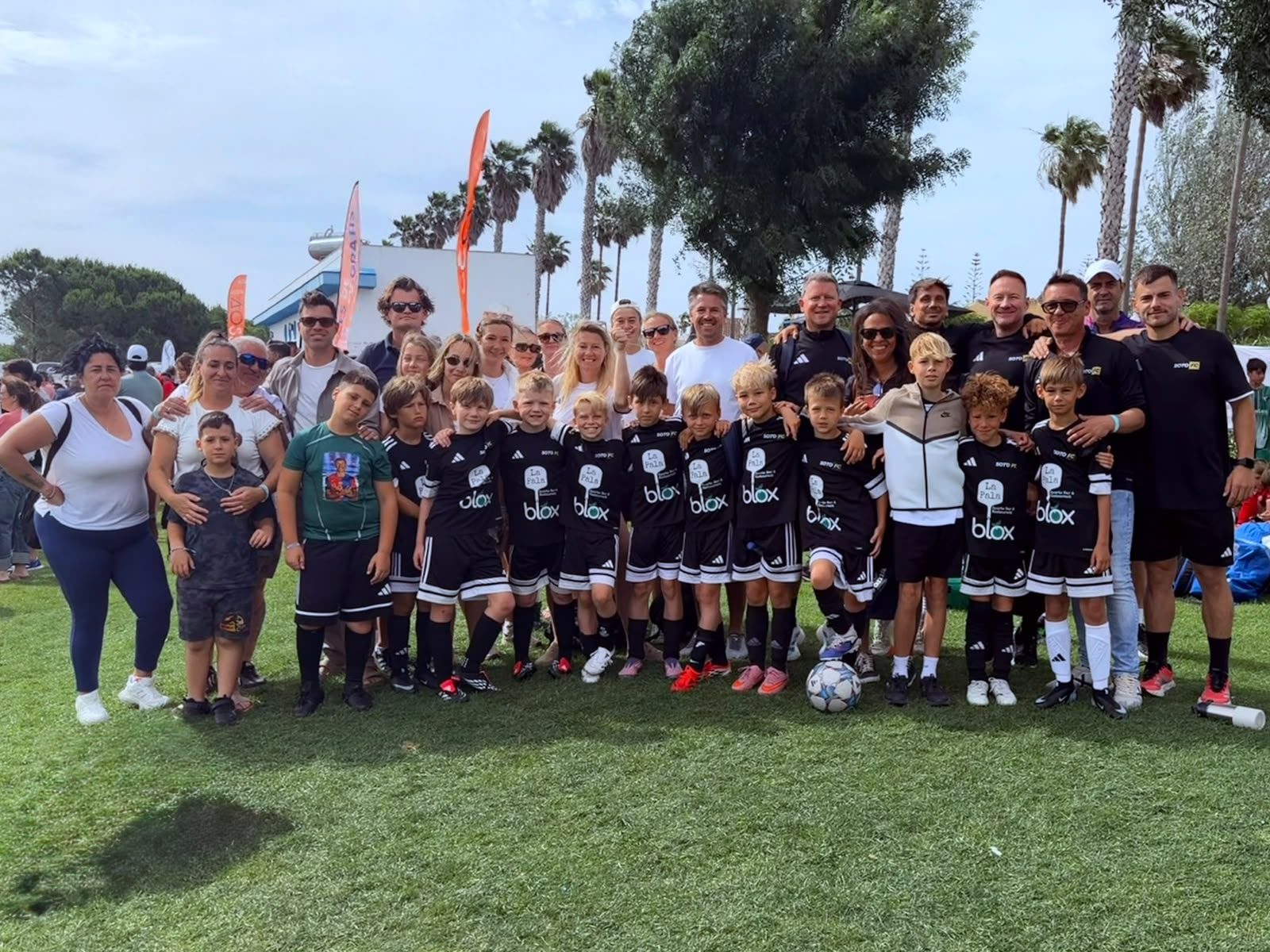 The whole club together after a tournament, players, coaches and families