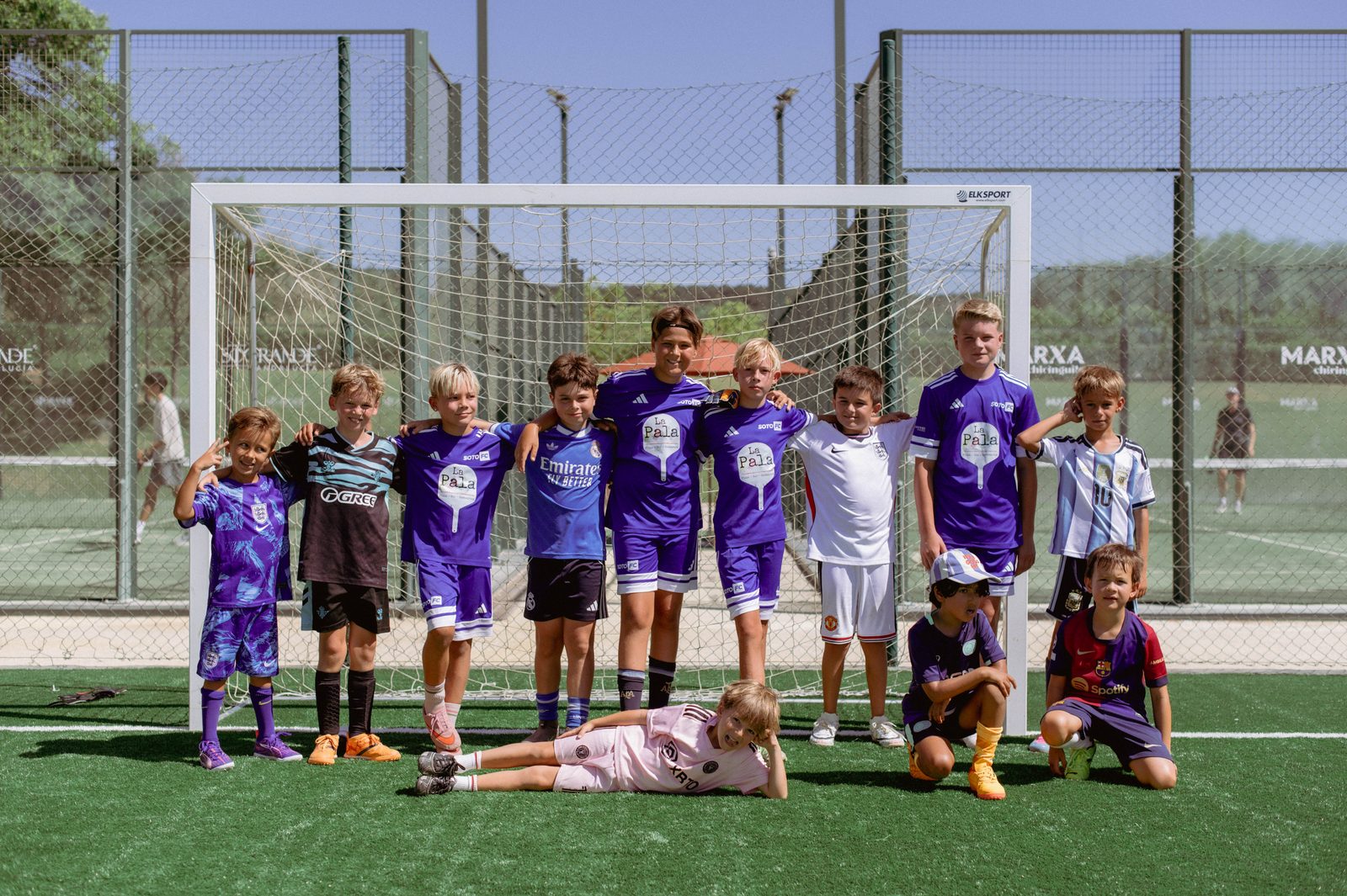 A camp group in front of the goal at the end of the morning