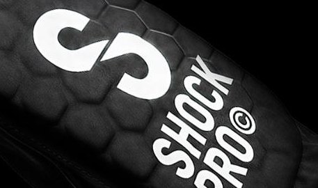 A Shock Pro shin pad sleeve: black, hexagonal padded panel with the Shock Pro logo.